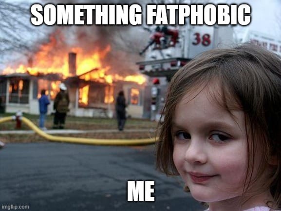 girl watching house burn